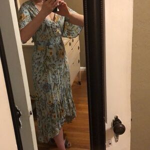 Anthropologie -Abel the Label brand. Gorgeous floral with petal sleeves.